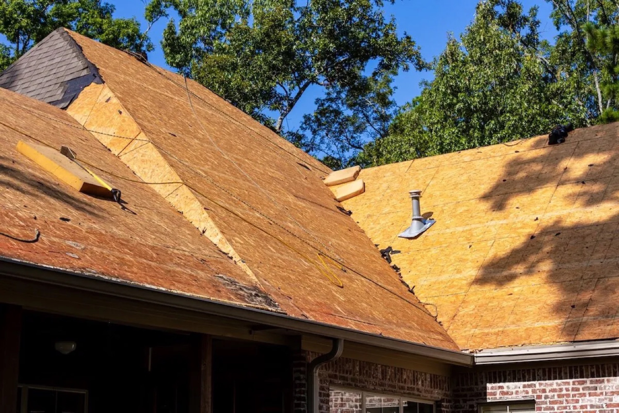 Roof stripped to the plywood deck for inspection